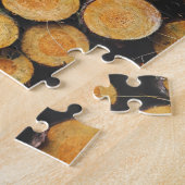 Der frisch geschnittene Stapel von Baumstämmen Puzzle (Seite)