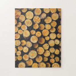 Der frisch geschnittene Stapel von Baumstämmen Puzzle