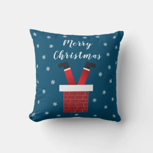 Der frohe Weihnachtsmann steckt in einem Kamin Kissen