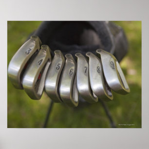 Der Golfclub zieht sich in eine Tasche. Drei bis n Poster