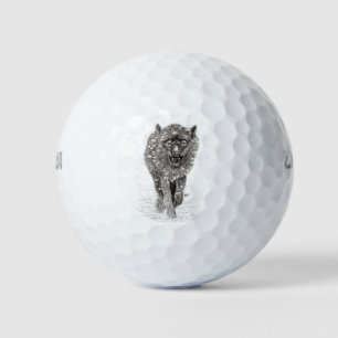 Der graue Schwarze Wolf im Schnee , der wilde Wint Golfball