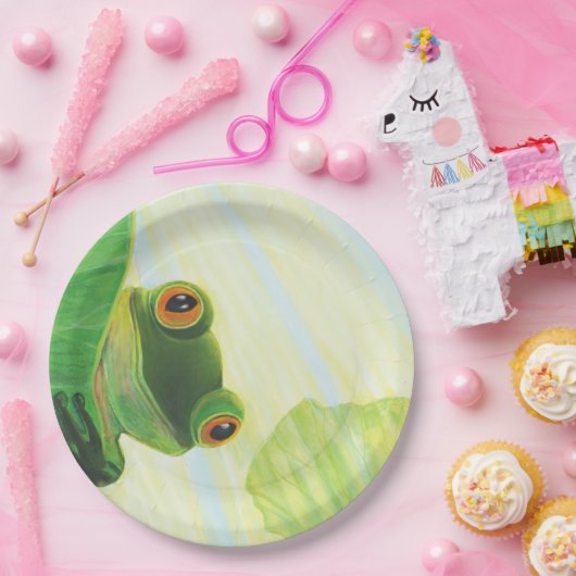 Der große mit Augen grüne Frosch hinter dem Lilien Pappteller (Party)