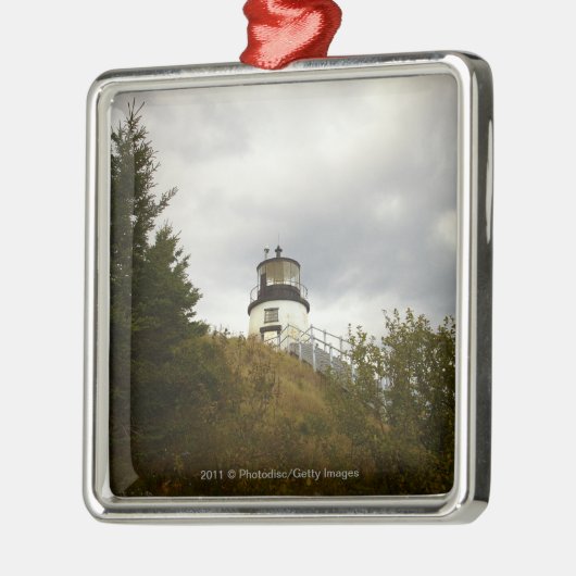 Der Hauptleuchtturm der Eule an einem bewölkten Silbernes Ornament (Links)