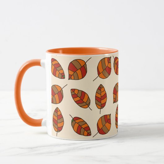 Der Herbst hinterlässt ein rotes Leaf-Muster in je Tasse (Links)