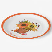 Der Herbst lässt Sonnenblumen in der Holzbügel dan Pappteller (Schrägansicht)