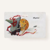 Der Hexenkuss: eine Kürbislaterne zu Halloween Ausweis (Rückseite)