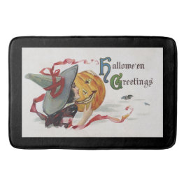 Der Hexenkuss: eine Kürbislaterne zu Halloween Badematte