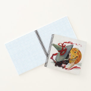 Der Hexenkuss: eine Kürbislaterne zu Halloween Notizblock