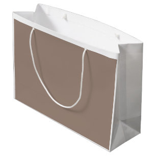 Der Hintergrund ist in verschiedenen Brauntönen ge Große Geschenktüte