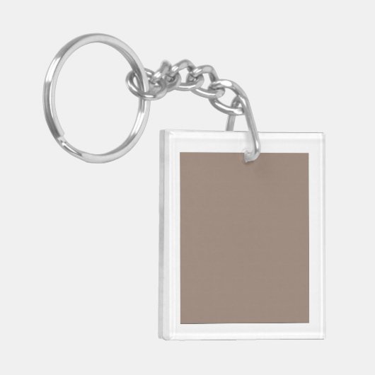 Der Hintergrund ist in verschiedenen Brauntönen ge Schlüsselanhänger (Vorderseite links)