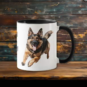 Der Hund der deutschen Schäferhunde ergreift den T Tasse