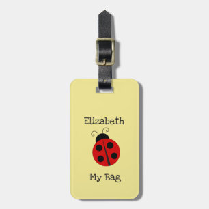 Der individuelle Name des Mädchens mit Marienkäfer Gepäckanhänger