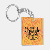 Der Kampf ist real Schlüsselanhänger (Vorderseite links)