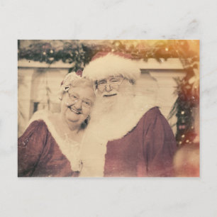 Der klassische Weihnachtsmann und Mrs. Claus Feiertagspostkarte