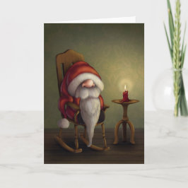 Der kleine Santa in seinem Schaukelstuhl Feiertagskarte