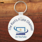 Der KPC-Logo-Schlüsselanhänger. Schlüsselanhänger (Rückseite)