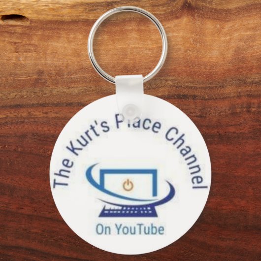 Der KPC-Logo-Schlüsselanhänger. Schlüsselanhänger (Vorderseite)