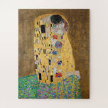 Der Kuss von Gustav Klimt Puzzle<br><div class="desc">Der Kuss von Gustav Klimt Der Kuss ist ein Ölgemälde mit Goldblatt, Silber und Platin vom österreichischen Symbolik-Maler Gustav Klimt. Es wurde irgendwann in den Jahren 1907 und 1908 gemalt, auf dem Höhepunkt dessen, was Gelehrte seine "Goldene Periode" nennen. Mit schimmernden Goldtönen, stilisierten Formen und sentimentaler Ikonographie verzaubert der Kiss...</div>