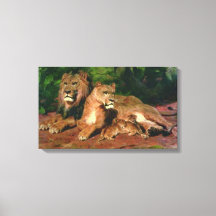 Der Löwe bei der Zuhause (mit Lioness und Löwenjun