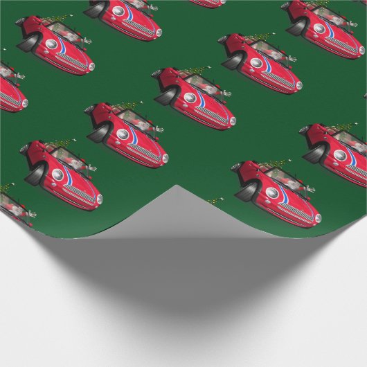 Der lustige Weihnachtsmann fährt eine Mini Geschenkpapier (Ecke)