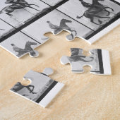 Der Mann und Pferd, die einen Zaun springen, Puzzle (Seite)