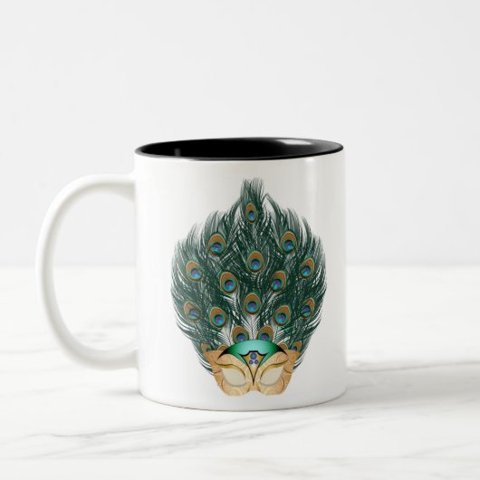 Der maskierte Pfau Zweifarbige Tasse (Links)