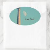 Der Mond und ein Turm: Aberystwyth Ovaler Aufkleber (Tasche)