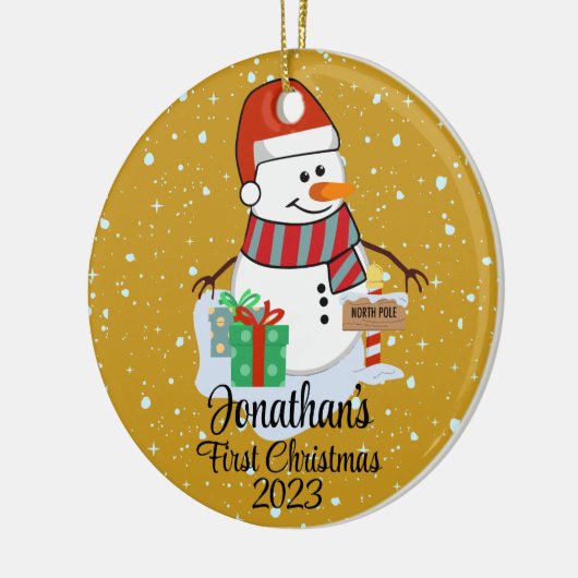 Der niedliche Schneemann des Babys in seiner moder Keramik Ornament (Links)