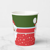 Der niedliche Weihnachtsmann sieht sich den tradit Pappbecher (Links)