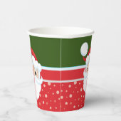 Der niedliche Weihnachtsmann sieht sich den tradit Pappbecher (Rechts)