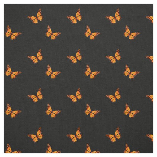 Der orange flatternde Schmetterling der Frauen auf Stoff (Muster)