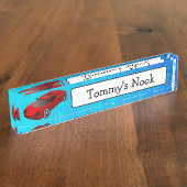 Der personalisierte Name des Kindes und Namensplakette (Seite)