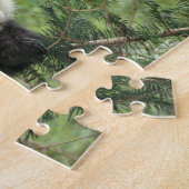 Der riesige Panda-Kub klettert auf einen Baum, Wol Puzzle (Seite)