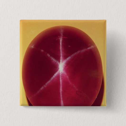 Der "Rosser Reeves" Stern-Rubin Button (Vorderseite)