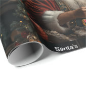 Der Santa-Workshop fügt dem Kind den Namen Ai hinz Geschenkpapier (Rolleneckpunkt)