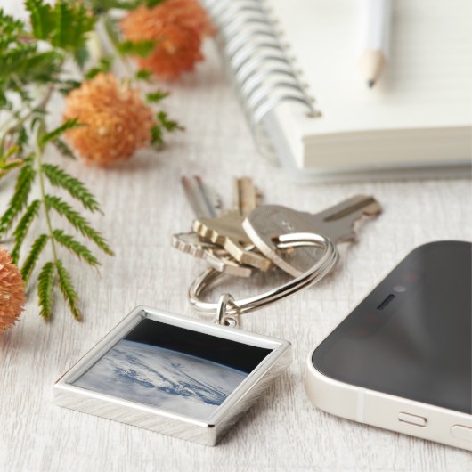 Der Schatten des Mondes, der auf dem Nordpazifik v Schlüsselanhänger (Seite)