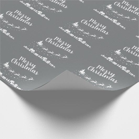 Der Schlitten des Weihnachtsmanns mit Rentieren üb Geschenkpapier (Ecke)