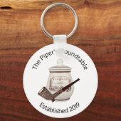 Der Schlüsselanhänger des Piper am runden Tisch de (Vorderseite)