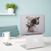 Der schöne Zeiger im Feld Aufkleber (Laptop auf Schreibtisch)