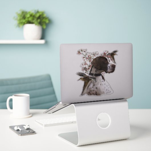 Der schöne Zeiger im Feld Aufkleber (Laptop auf Schreibtisch)