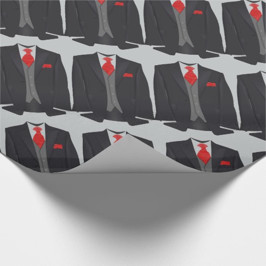Der schwarze Anzug der Männer und rotes Geschenkpapier (Ecke)