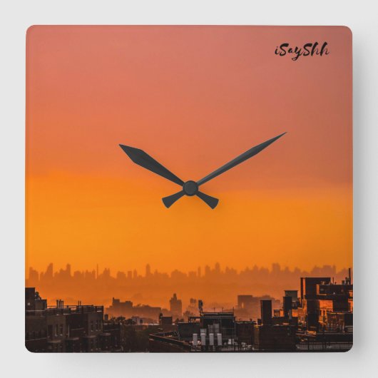Der Sonnenuntergang über der Stadt Quadratische Wanduhr (Vorderseite)