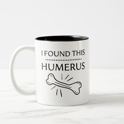 Der Spaß des Sonnenbades, ich fand diesen Humerus, Zweifarbige Tasse (Links)