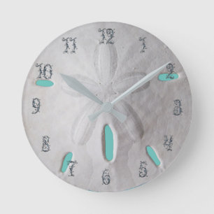 Der Strand des Sand-Dollar-Ozeans ist türkisblau Runde Wanduhr