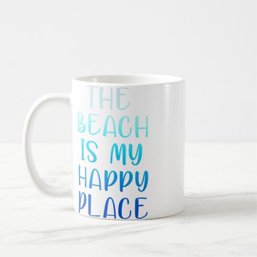 DER STRAND IST MEIN GLÜCKLICHER ORT KAFFEETASSE (Links)