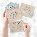 Der tropische Strand lädt zu einer Hochzeit ein All In One Einladung<br><div class="desc">Eine 3 in 1 Hochzeit in Urlaubsort mit drei Facetten,  mit einem sommerlichen tropischen Strand-Insel-Hintergrund,  einem Vintagen Sandstrand mit zwei Herzen am Ufer,  Ihren Initialen,  den Hochzeitsdetails,  Einladung und einer uAwg-Postkarte für Ihre Gäste,  die abreißen und zurückschicken.</div>