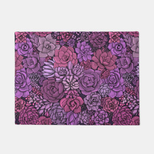 Der üppige Garten in Rosa und Violett Fußmatte