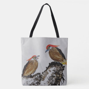 Der Vogel auf einer Feder Tasche