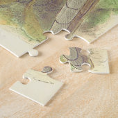 Der Vogel ist auf einem Zweig platziert, das Puzzl Puzzle (Seite)