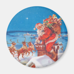 Der Weihnachtsmann auf dem Dach mit seinem Rentier Magnet